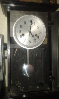 ساعة حائطية ميكانيكية قديمة  من صنع الصين للبيع 3